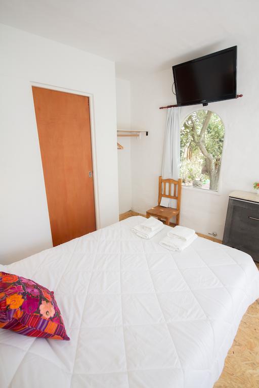 بويرتو مادرين Hosteria Casa De Mar الغرفة الصورة